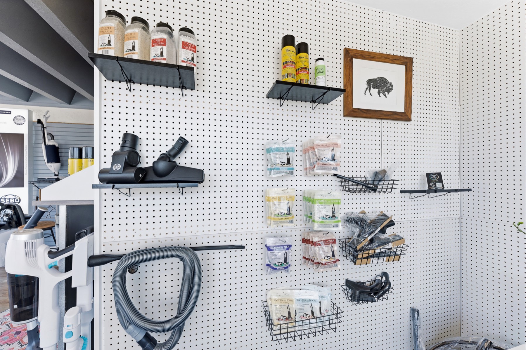 Bags, belts, and attachments from the shop’s repair inventory