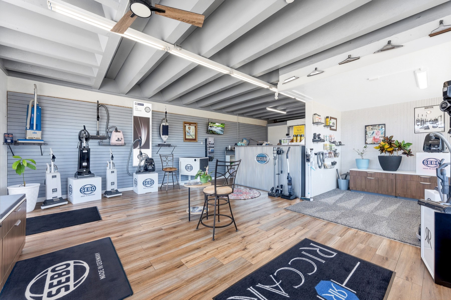 Showroom floor with Sebo and Riccar displays